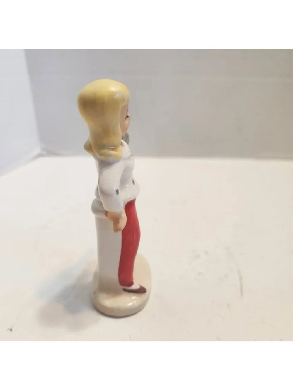 Vintage Small Ceramic Figurine Of Woman Red Pants & White Blouse with Radio READ